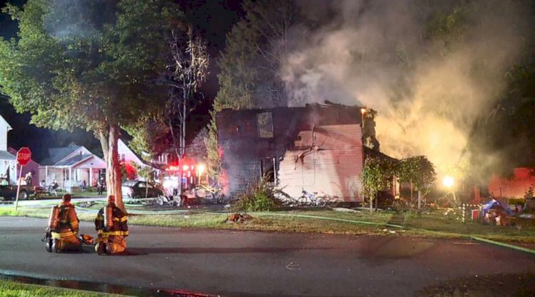 US fireman finds 10 dead in house blaze are his family